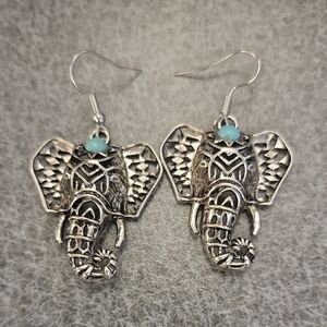 Ornate Silver Elephant Earrings with Filigree Design